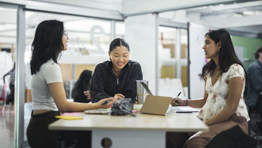 Stanford students collaborating at a Design for Extreme Affordability event